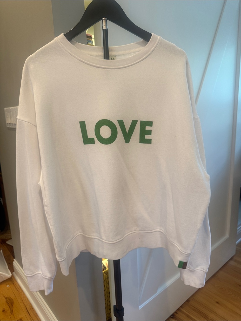 KULE White Crewneck Sweatshirt with Green Logo Tag